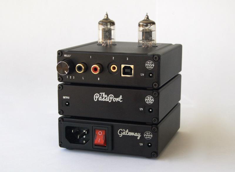 An ALO Audio Pan Am DAC and headphone tube amplifier desktop stack with external power supply