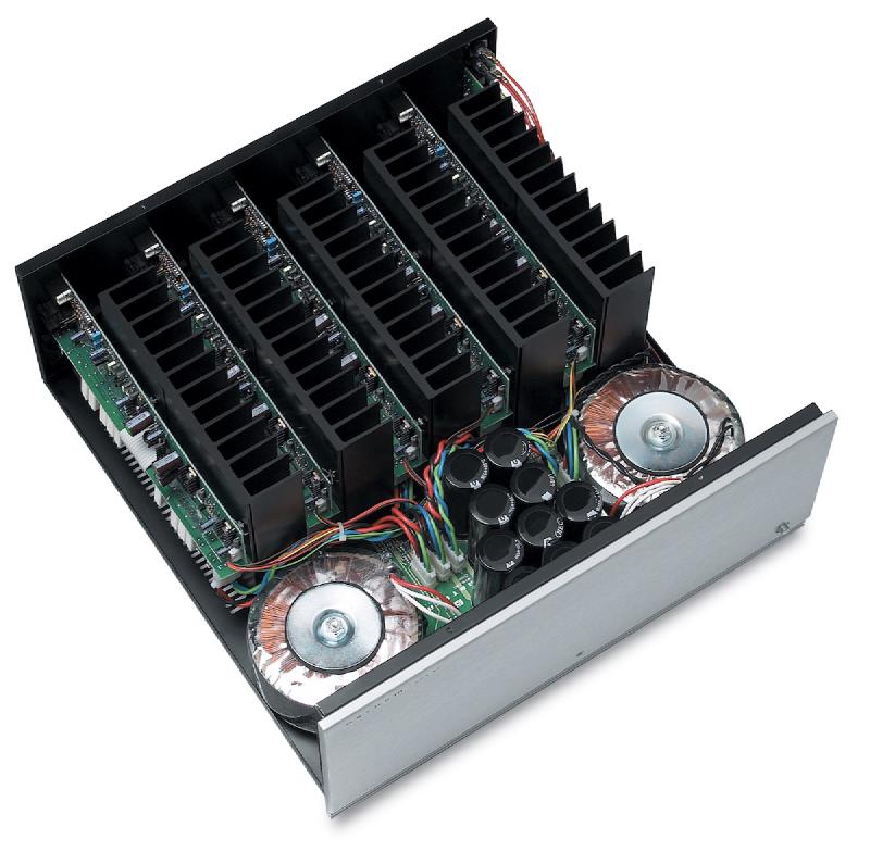 The internal chassis of an Anthem MCA 50 power amplifier showing large transformers and heatsinks