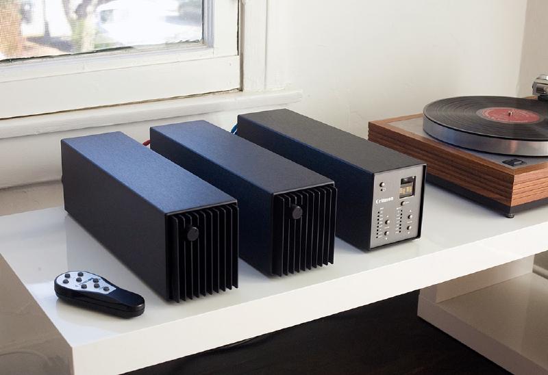 A pair of monoblock power amplifiers paired with a matching pre-amplifier