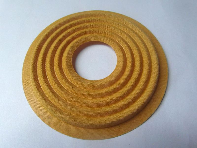 The spider component inside a loudspeaker driver