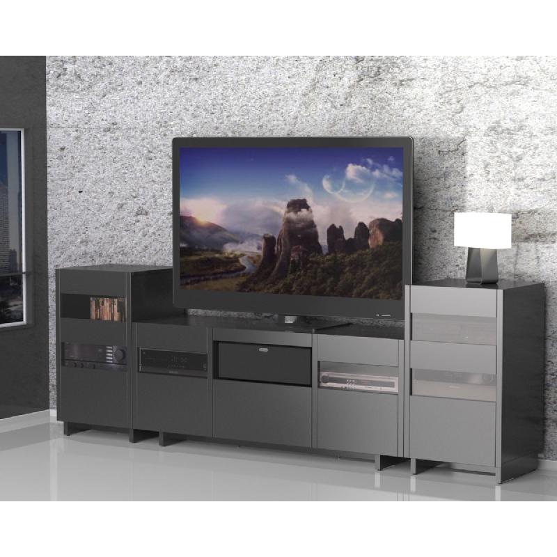 A centre channel speaker placed inside an entertainment unit cabinet, demonstrating poor placement that colours the sound