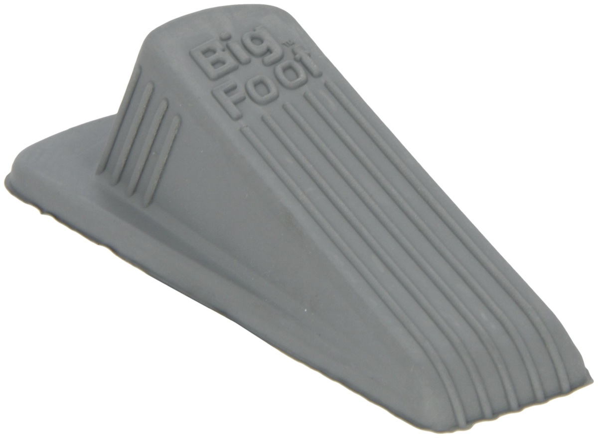 A rubber door stop used as a low-cost solution for angling a centre channel speaker
